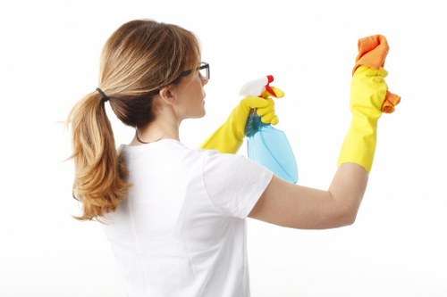Technician inspecting cleaning equipment and safety controls