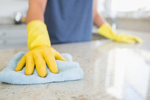 Team member reviewing workplace safety procedures before a cleaning task
